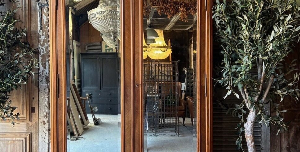A large Teak Wood Cabinet Called Armoire with a mirror