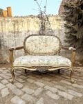 Petite settee in classic Louis XV